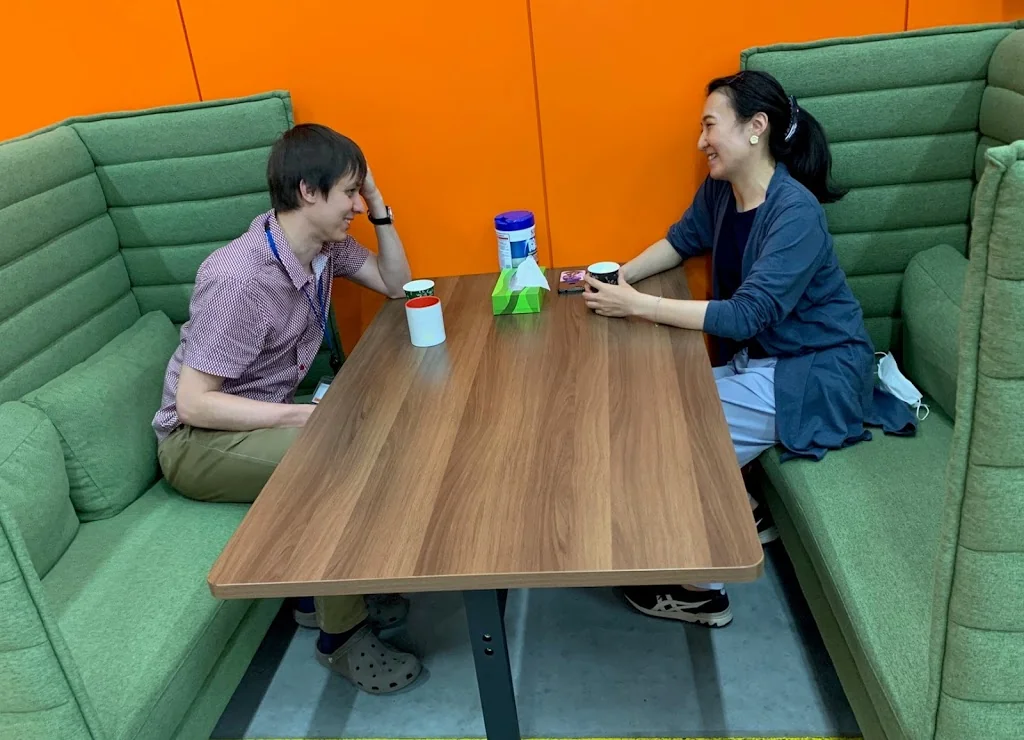 Informal discussions by coffee machine