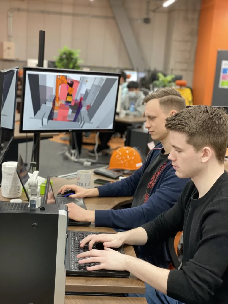 Mujin Software Developers at Work